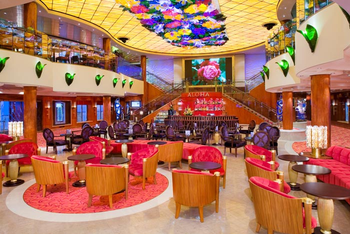 El Atrium del Norwegian Jade de inspiración Hawaiana está decorado con Flores de Cristal Soplado realizadas a mano CRUCEROS NORWEGIAN JADE CRUCEROS MEDITERRANEO CRUCEROS DE OFERTA CRUCEROS ECONOMICOS CRUCEROS EN OFERTA SEMANA DEL CRUCERO CRUCERO FANTASTICO OFERTAS CRUCEROS AL MEJOR PRECIO CRUCEROS BARATOS